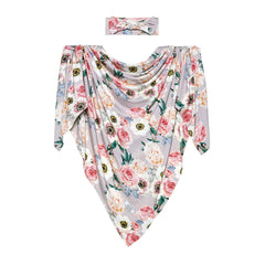 Posh Peanut newborn girl swaddle in use for snug, secure wrapping