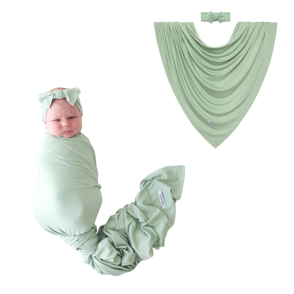 Posh Peanut Sage swaddle blanket closeup shows soft bamboo knit for gentle newborn comfort.