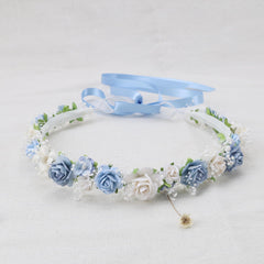 PoshMyra dusty blue crown worn by child for weddings or parties