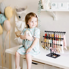 POVETIRE 3-tier bow organizer displaying many bows neatly, saves time during outfit changes