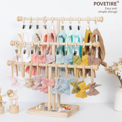 POVETIRE wooden bow organizer showing accessible headbands and accessories