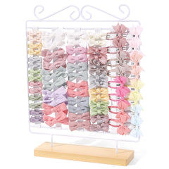 POVETIRE bow holder with wooden base keeps girl's hair bows neatly organized.
