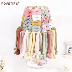 POVETIRE bow organizer metal base close-up highlighting stability