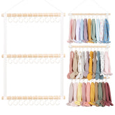 POVETIRE headband holder on wall for easy access to headbands.