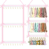 POVETIRE headband holder in white wood with pink bow keeps headbands neatly organized for quick access