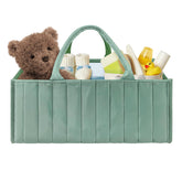 POXXU diaper caddy basket keeps diapers and wipes within easy reach on the changing table.