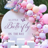 PQQIEE Butterfly Decal arch-backdrop adds whimsical charm to baby showers and photos.