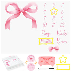Preboun baby milestone blanket pink Coquette bow backdrop for newborn photos.