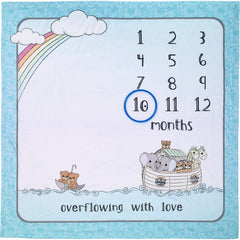 Precious Moments ark milestone blanket marks months in the nursery with Noah's Ark design.