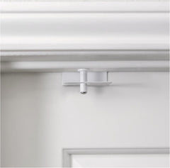 Predictable Solutions GlideLok top lock on interior door demonstrates child safety.