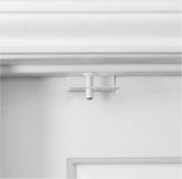 Predictable Solutions GlideLok top-lock on a door keeps kids out of restricted areas.
