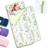 PRIMLECT toddler nap mat in green grass laid out for daycare naptime.