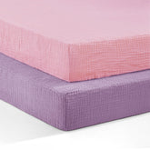 Pro Goleem muslin pack-n-play sheets pink—soft touch for delicate baby skin.