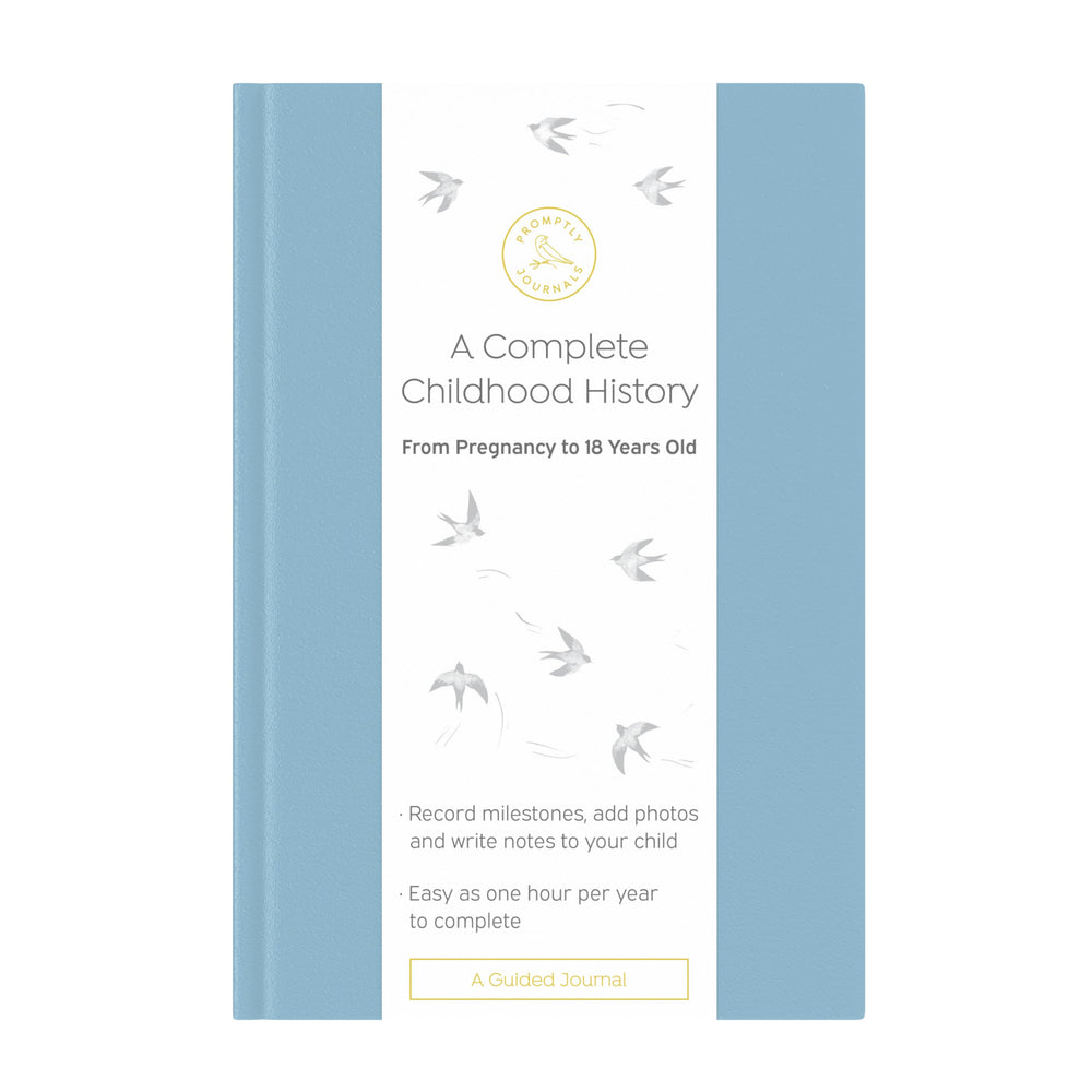 Promptly Journals dusty-blue leatherette cover highlights a premium keepsake for family memories