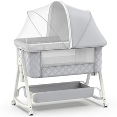 Pudult baby bassinet bedside-sleeper beside bed for easy nighttime care.