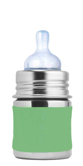 Pura Kiki bottle with moss sleeve showing plastic-free design for eco-friendly feeding.
