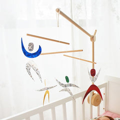 Purgano Montessori Mobile crib setup shows safe mounting.