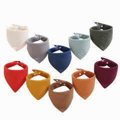PurlHaven Muslin Bibs pack β close-up of extra-absorbent cotton for drool and spills.