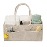 PUTSKA baby diaper caddy in dark mocha keeps diapers and wipes within easy reach