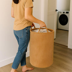 PUTSKA blanket basket in brown for living room décor and concealment of throws.
