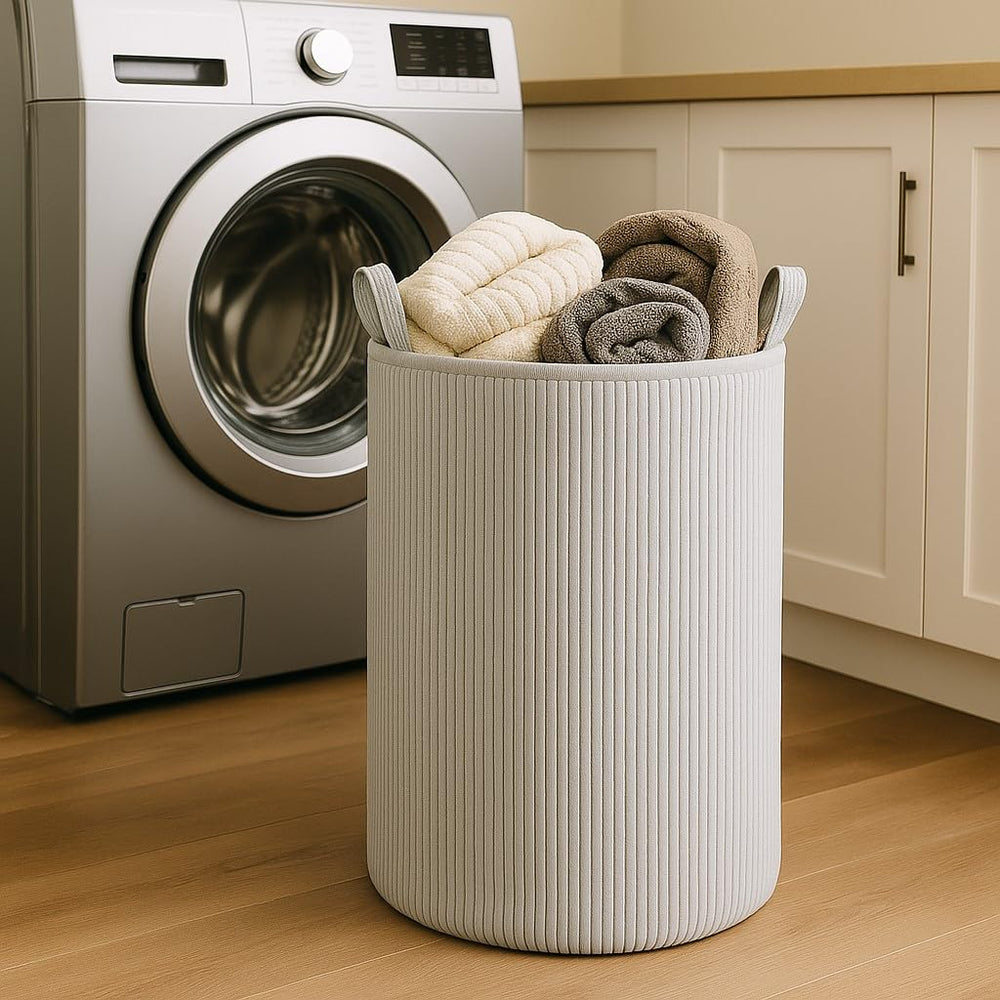 PUTSKA laundry basket hamper exterior in grey shows roomy storage for clothes and toys.