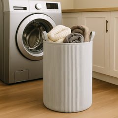 PUTSKA laundry basket hamper exterior in grey shows roomy storage for clothes and toys.
