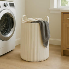PUTSKA laundry basket XXL cream front view shows sturdy handles for easy transport
