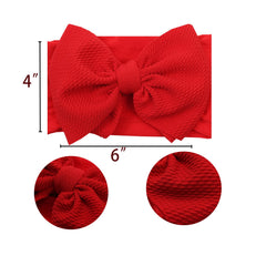 QFV Big bow design illustrates photo-ready styling for moments.