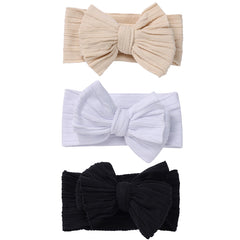 QFV Baby Girl Bows headband newborn closeup showing soft gentle fit