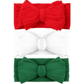 QFV Christmas baby bows headband closeup shows soft skin-friendly fabric for photoshoots