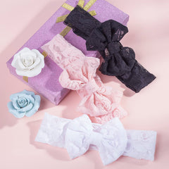 Qiansail baby girls lace headband worn on a toddler, lightweight fit for various hairstyles.