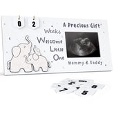 Qilxziy sonogram frame displays ultrasound photo for nursery memories.