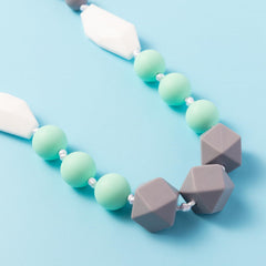 QIMGIC teething necklace style variation 01 highlights textured beads for curiosity