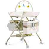 QMHHRJT foldable portable changing table beige with wheels enables safe, on-demand diaper changes.