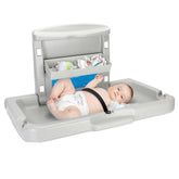 Qnemaei wall-mounted baby changing station front view highlights space-saving design and easy cleaning.