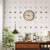 QUCHENG Boho wall stickers with flowers and leaves brighten a bedroom decor.