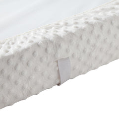 QUENESS plush dot fabric highlights a cozy surface ideal for quick diaper changes