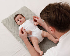 QUENESS BABY changing pad cover with elastic band-fit stays secure on your pad.