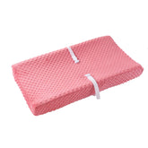 QUENESS strawberry red closeup shows ultra-soft fabric for baby's comfort during diaper changes.