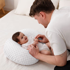QUENESS BABY nursing pillow ready for bottle feeding use with hands-free comfort.