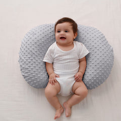 QUENESS BABY nursing pillow gray side angle shows ergonomic support during feeding