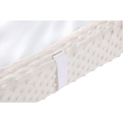 QUENESS beige waterproof back helps keep the changing pad dry after messes