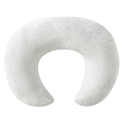 QUENESS pillow shows baby buttocks on dimples for secure positioning