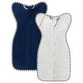 QUENESS Transition Swaddle 2-pack in light grey and estate blue supports gentle sleep transitions.