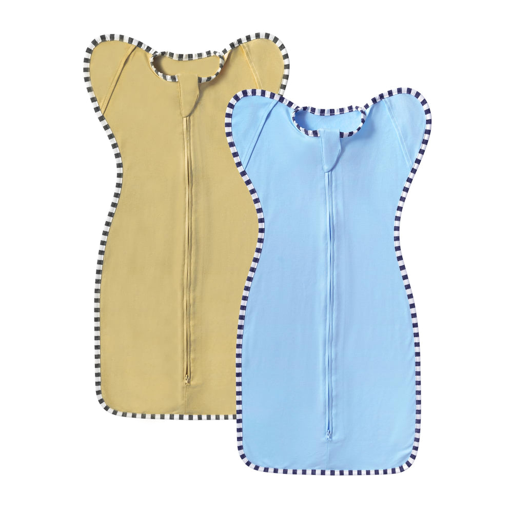 QUENESS transition swaddle arm-up cuffs offering comfortable room for growth during sleep
