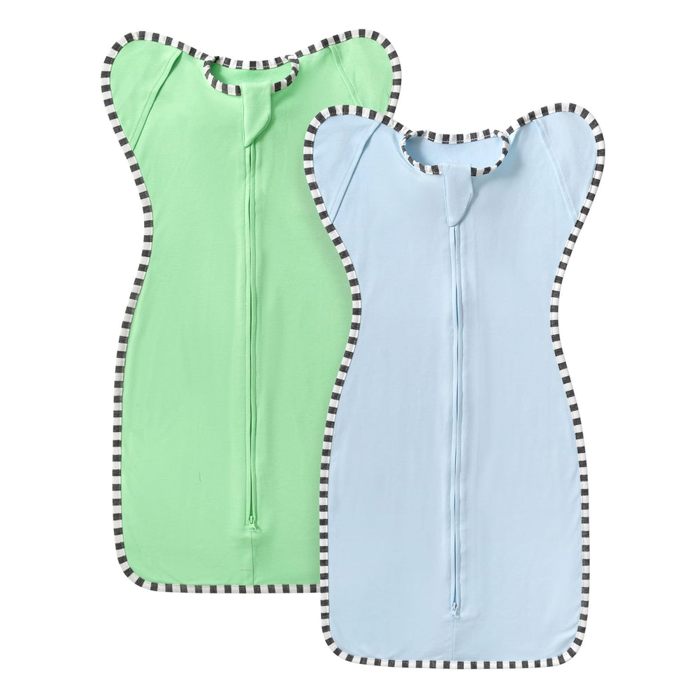 Queness Transition Swaddle blue arm-up close—soft cotton for gentle, breathable sleep.