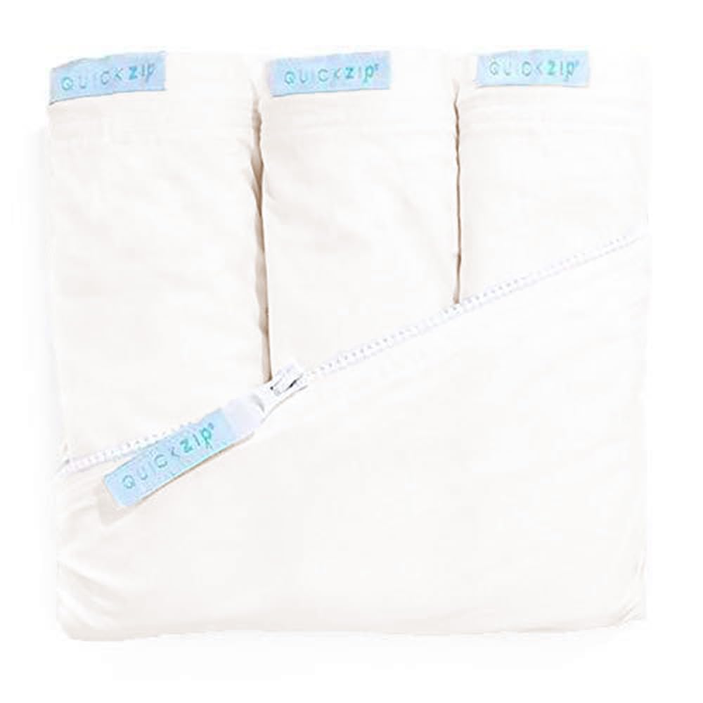 QuickZip ivory wraparound base securely fits a crib mattress for fast changes