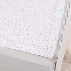 QuickZip wraparound base securefit shown securing mattress for stable, long-lasting coverage.
