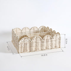Quincry rattan basket on dresser top ideal for nursery organization.