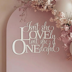 QWTOWFM Isnt She Lovely Onederful Sign in nursery decor for a warm, welcoming mood.